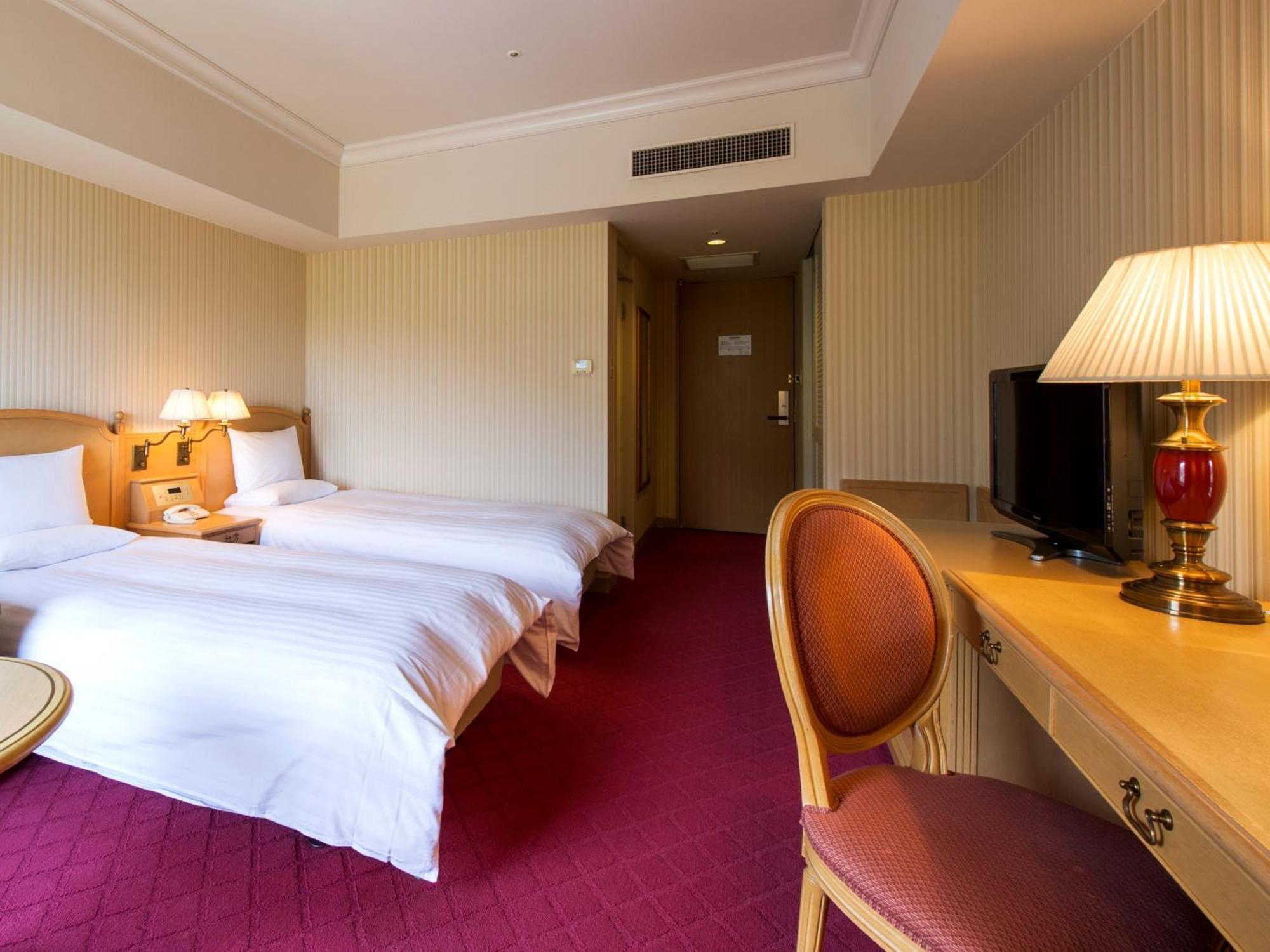 Hotel Okura Jr Huis Ten Bosch Sasebo Exterior foto A room at the hotel